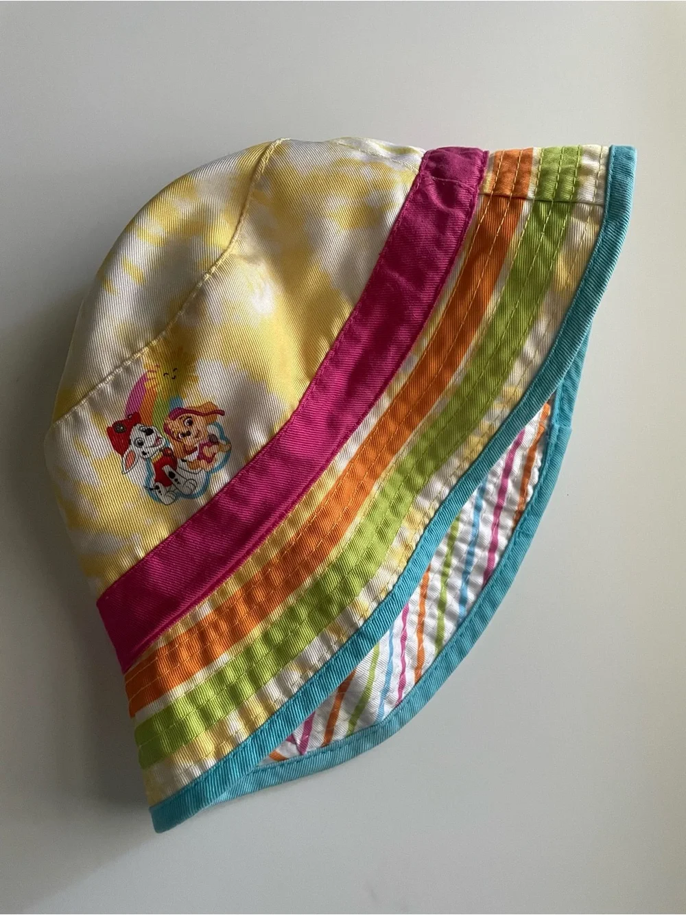 Paw Patrol Rainbow Stripe Reversible Bucket Hat in Yellow, Pink, Orange & Blue